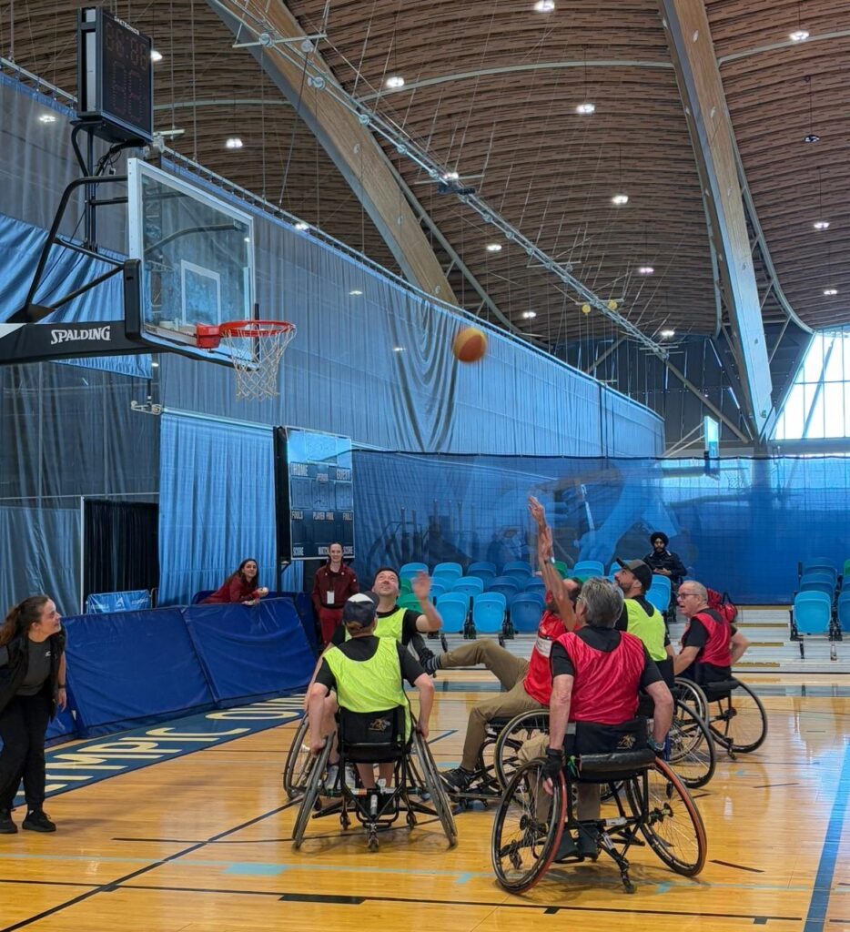 Skill development. Group of people playing basketball.