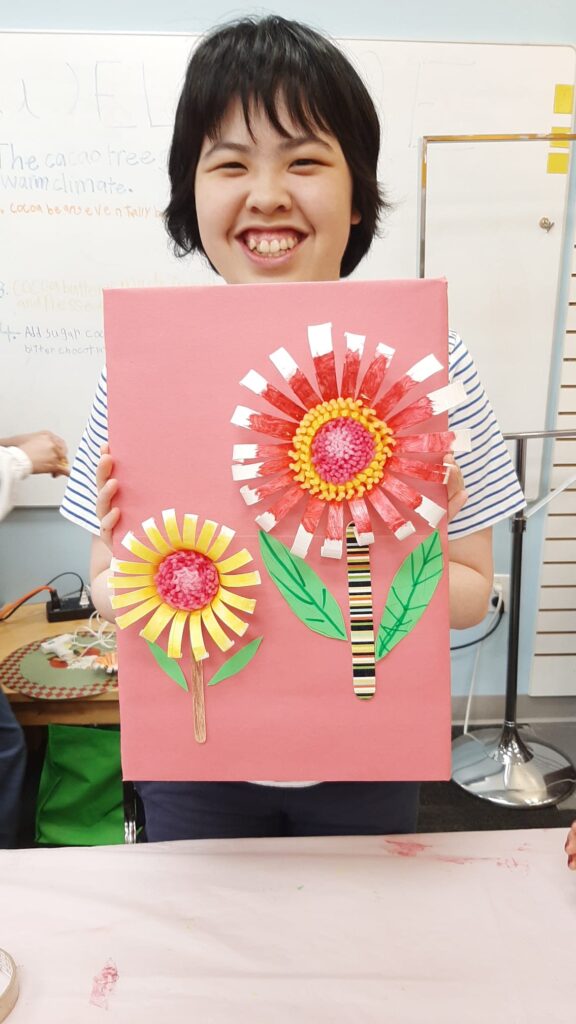 Person Holding Arts And Crafts Project